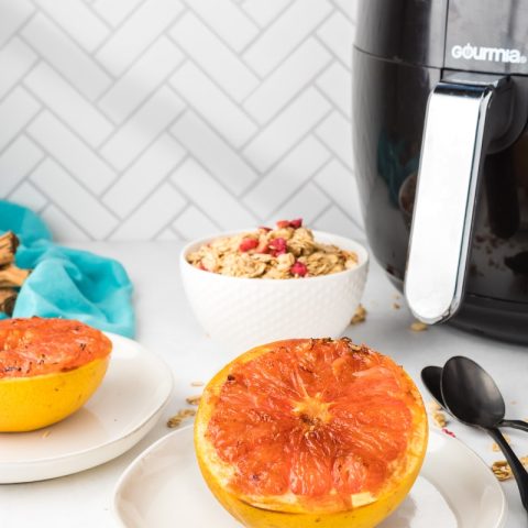 sliced orange fruit on white ceramic plate